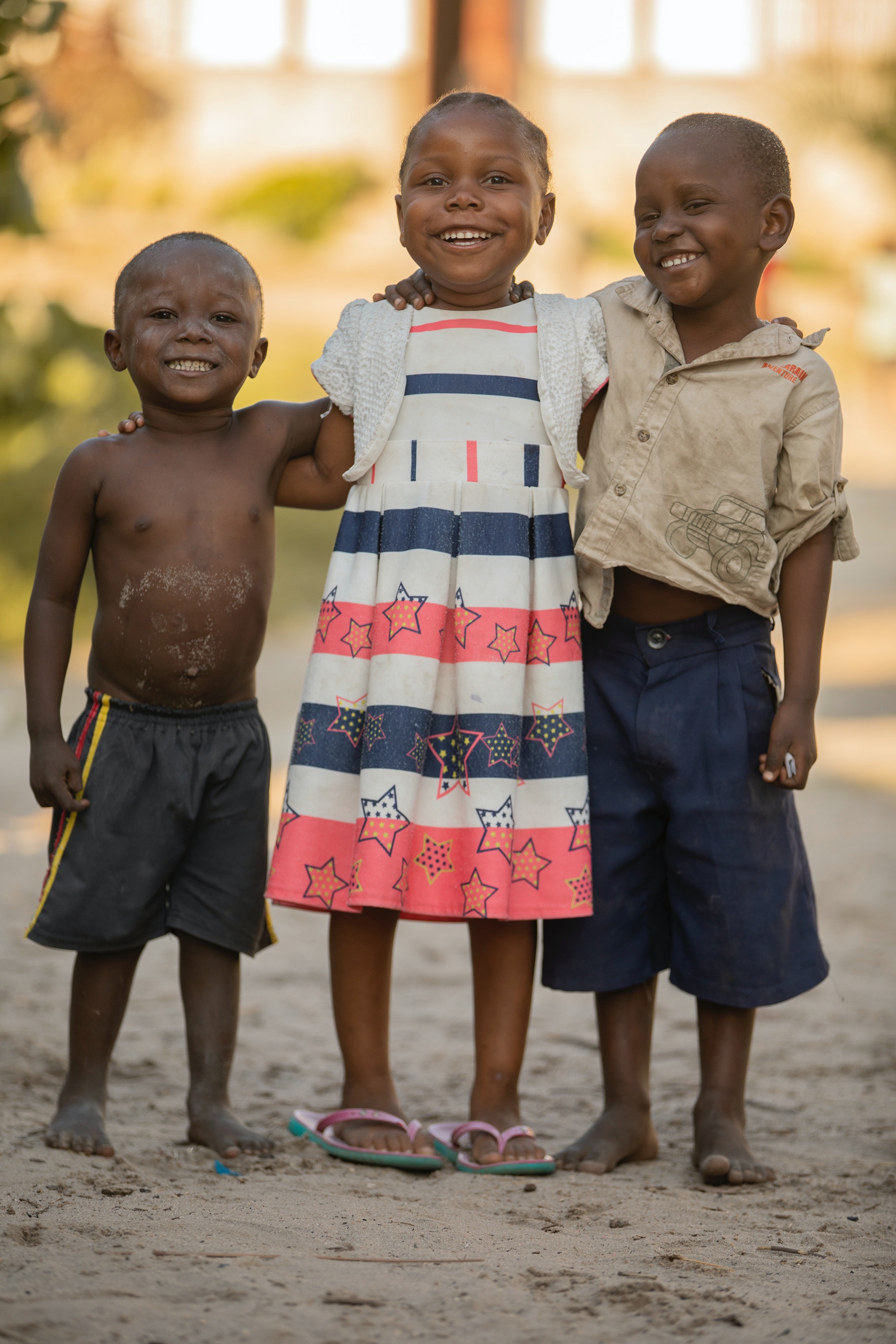Ghana, street kids, holding hands